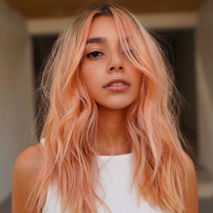 Peach Fuzz Perfection: Embracing Orange Hair Color Trends for 2024