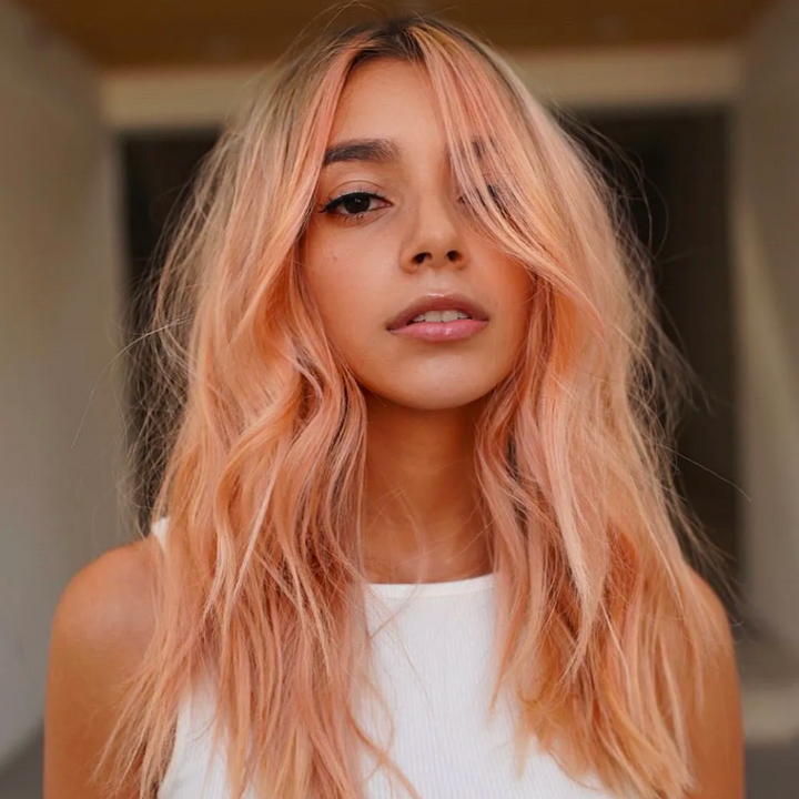 Peach Fuzz Perfection: Embracing Orange Hair Color Trends for 2024 - HairMNL Trends Tousled Online Magazine